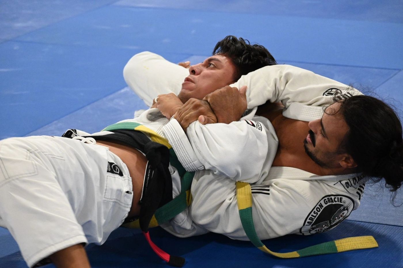 Adults rolling in gi at Carlson Gracie Miami