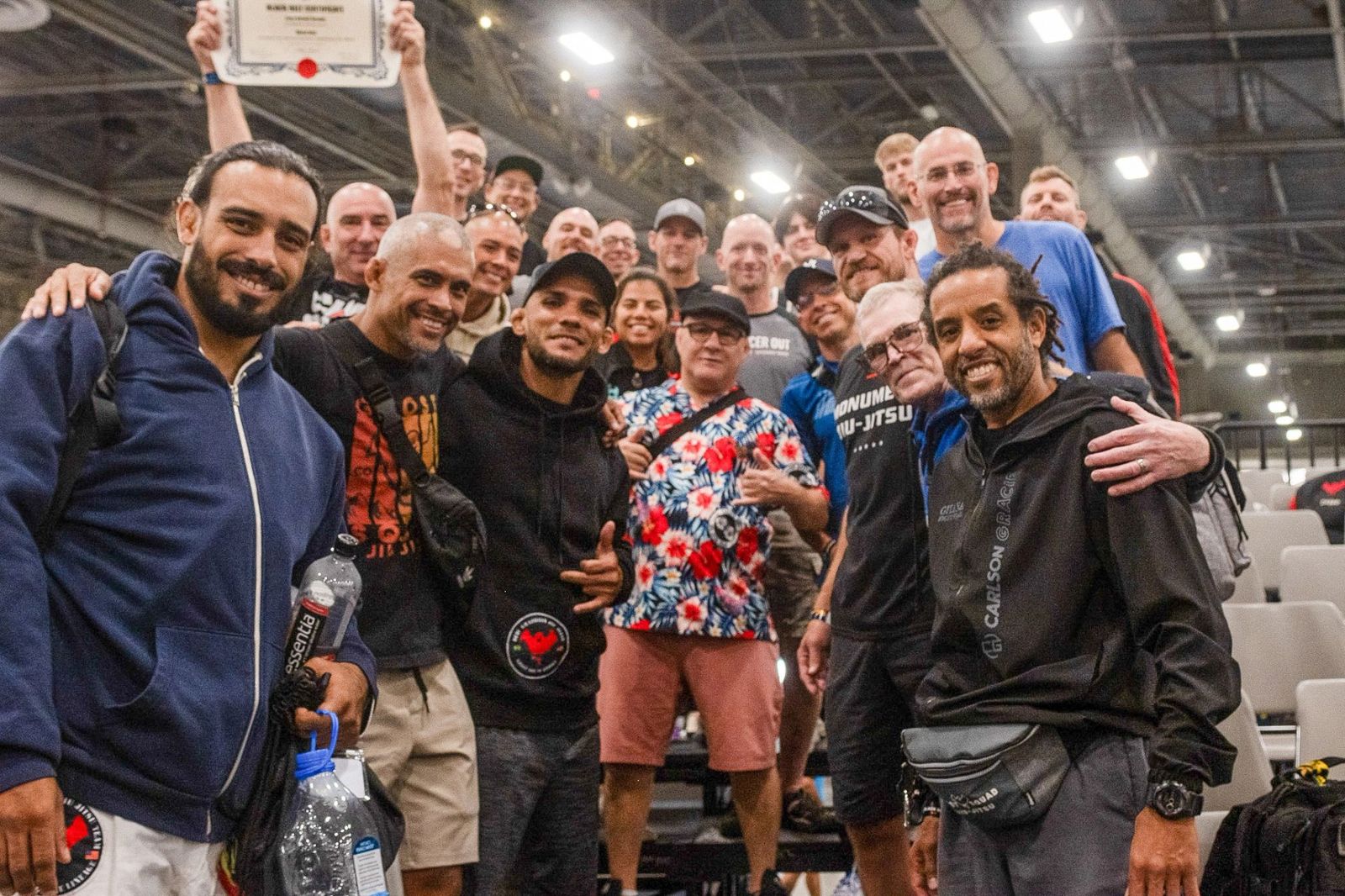 Large Carlson Gracie Miami team group photo at a tournament