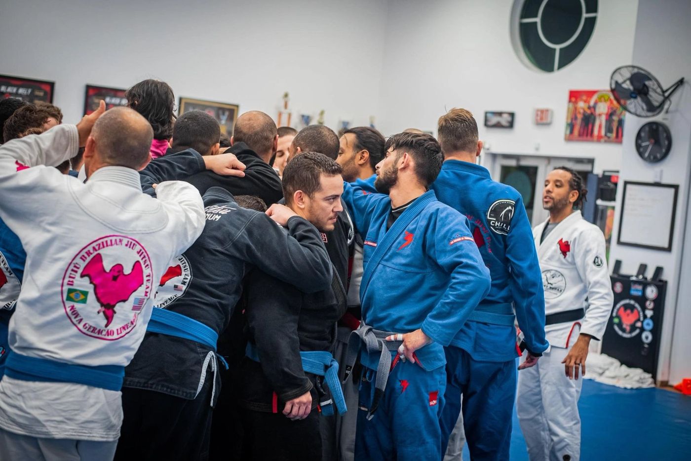 Carlson Gracie Miami teammates embracing after training